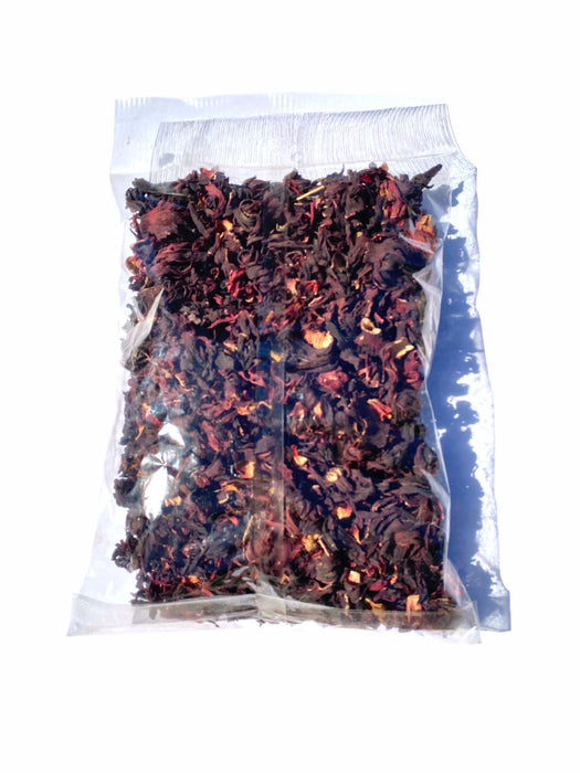 Vibrant dried hibiscus flowers in a clear poly bag. AFRIVANA African Superfoods