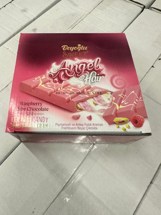 Box of Angel Flair raspberry chocolate candy on a tiled floor