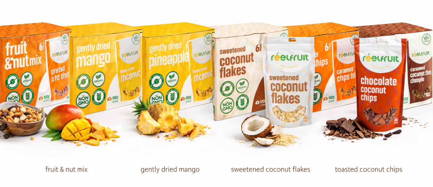 Assorted dried fruit snacks including fruit & nut mix, dried mango, coconut flakes, and chocolate coconut chips. Distributed by AFRIVANA.com